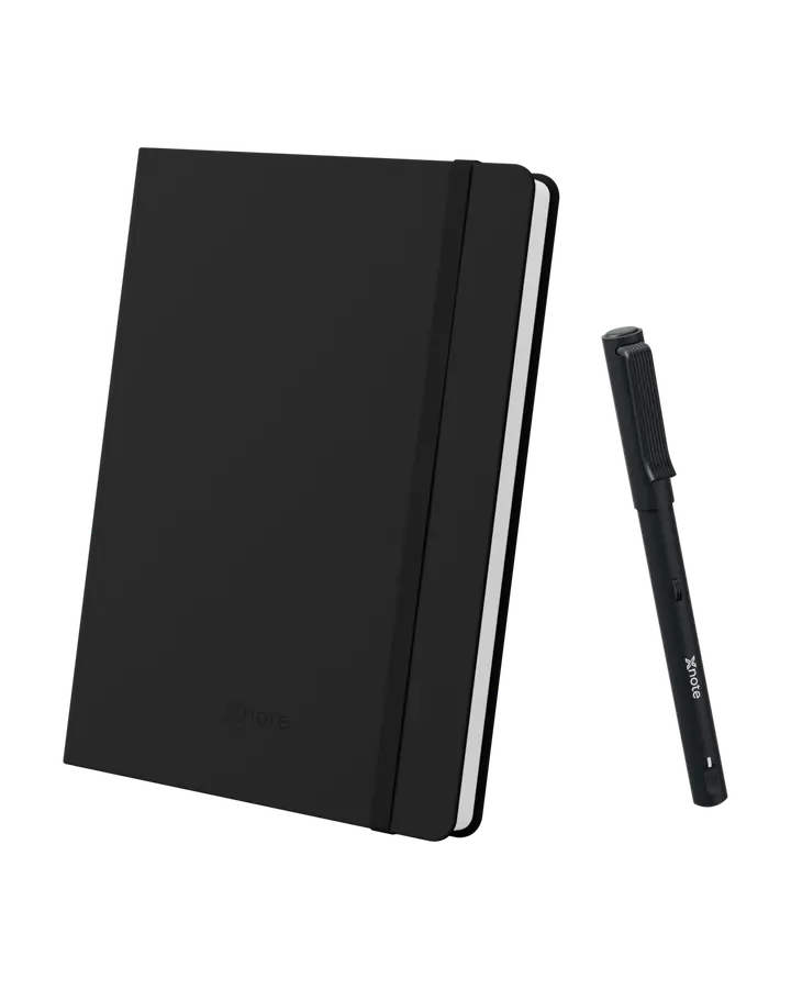 XNote Write: the XNote smart pen beside a Standard notebook